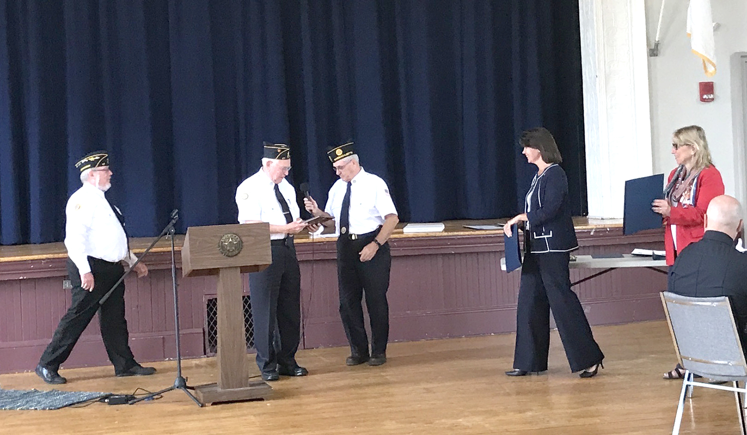 Above: On September 9th, Bob Hopkins, was recognized as this year’s “Unsung Hero” by the Holliston American Legion Post 47, as well as by the Massachusetts House and Senate, represented by Carolyn Dykema and Karen Spilka. The 9/11 awards recognized 14 members of the Holliston Police Department and three members of the Holliston Fire Department for actions going above and beyond the call of duty.