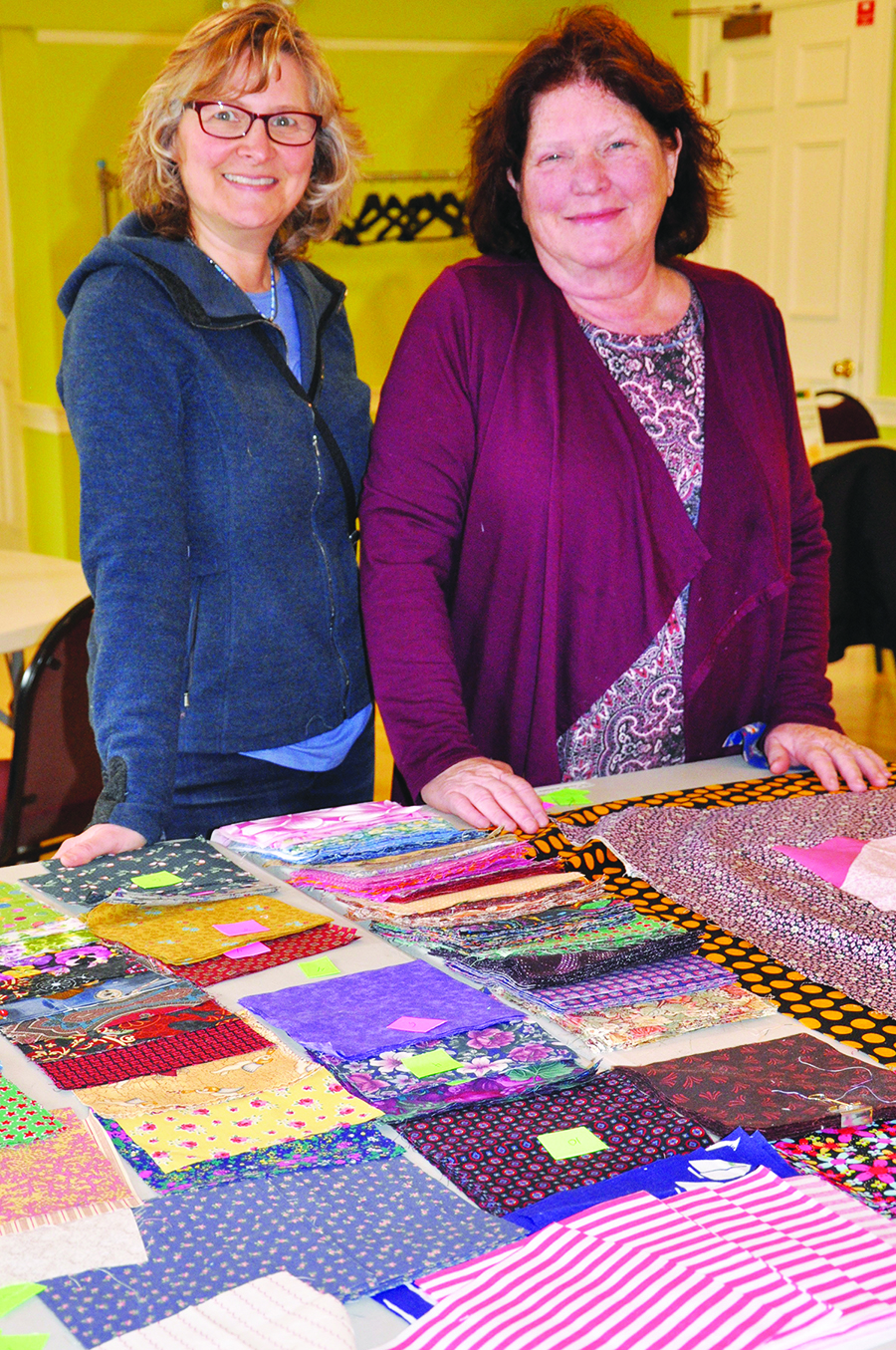 Susan Mogren and Catherine Healy enjoy giving back though this unique charity quilting project. (Photo/Deborah Burke Henderson)