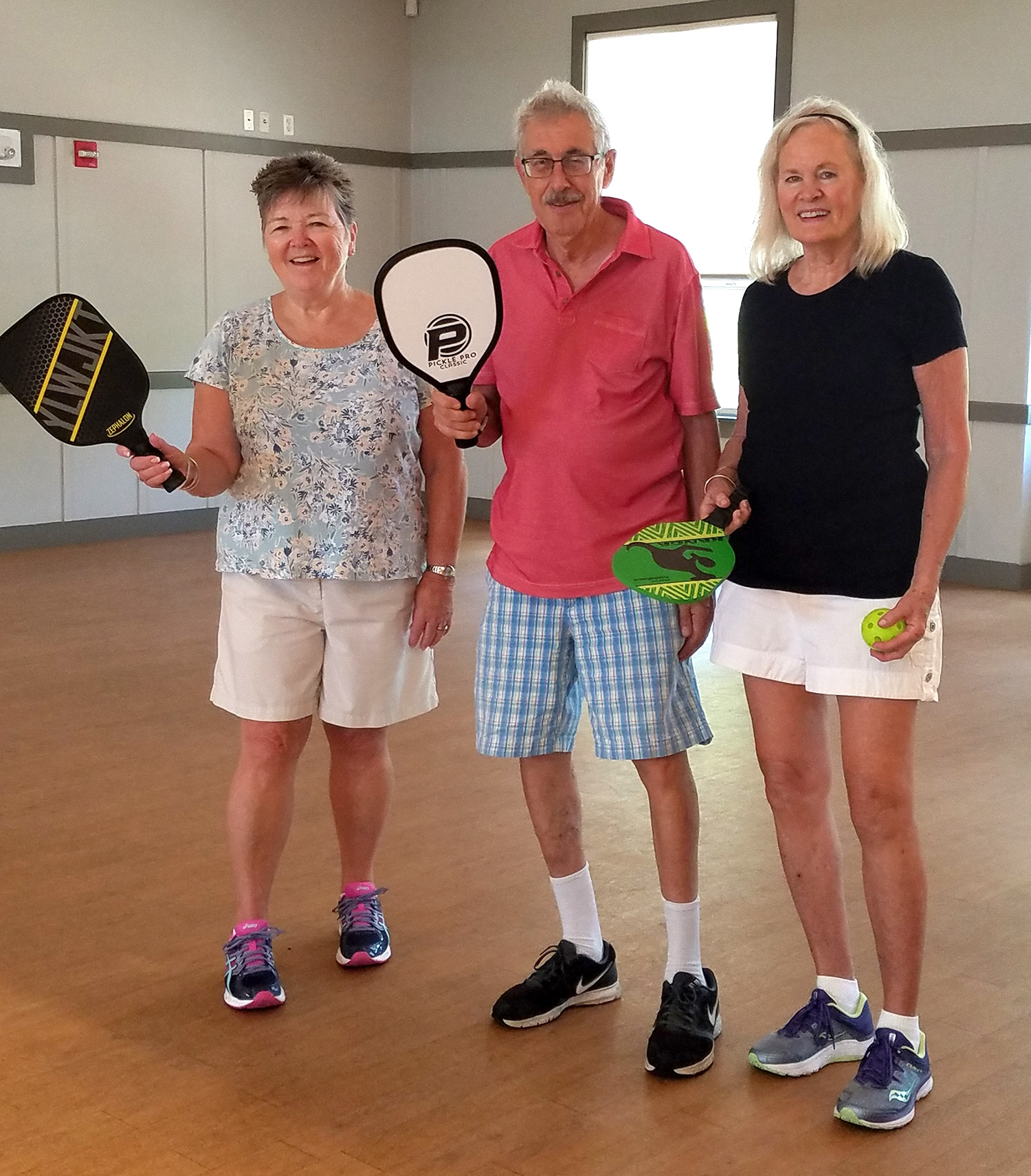 Pickleball players (l to r) Nancy Puia, Ira Felkenheim and Connie Mannal. (Photo/courtesy of the Ashland Senior Center)