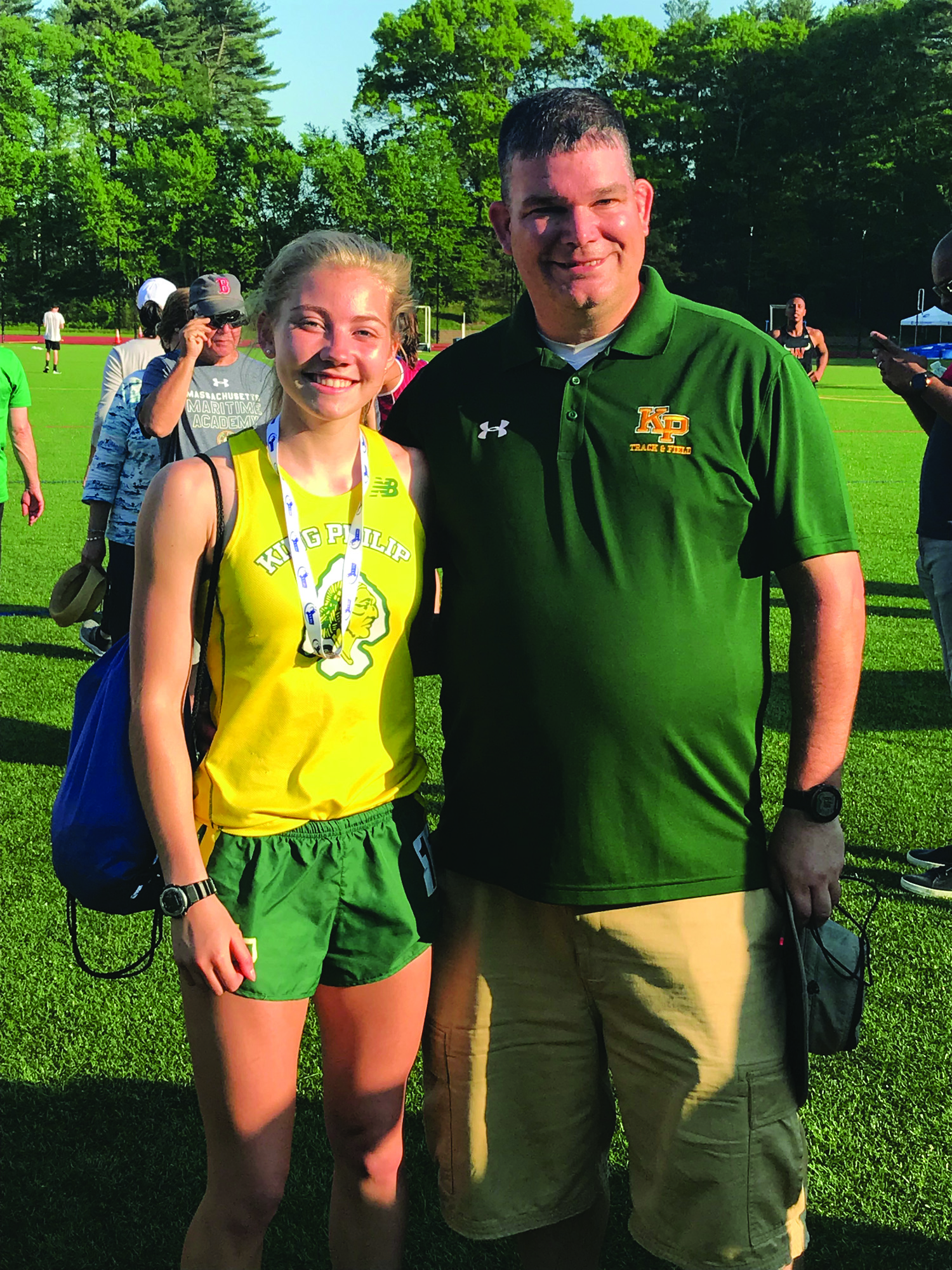 Abby Dunne with Coach Kramer at the MIAA D2 Pentathlon, held at Notre Dame Academy, where Dunne finished 3rd and set the school record.