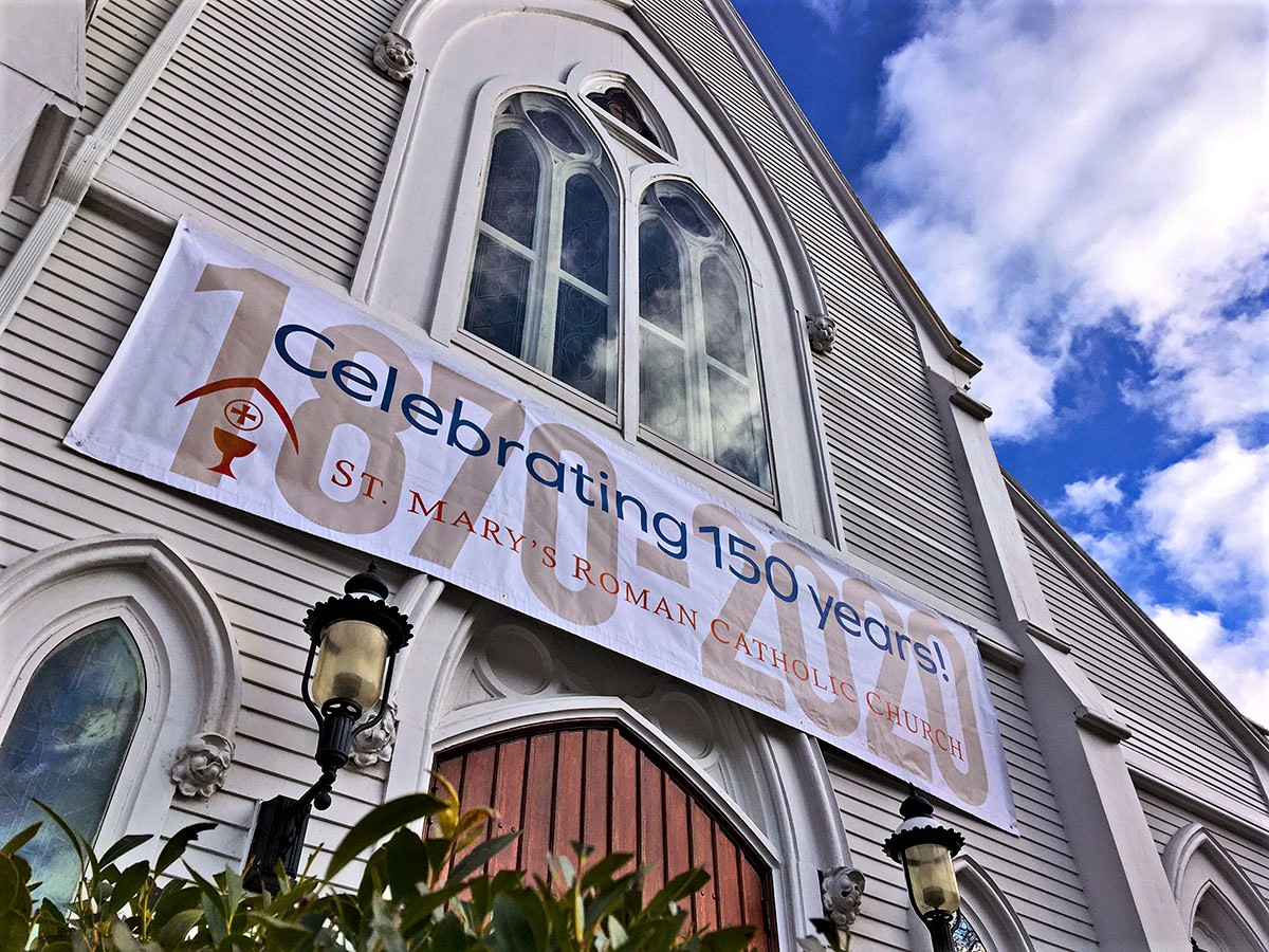 A banner over the front entrance welcomes visitors to St. Mary’s Parish during this milestone year.