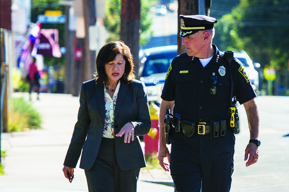 Pictured: Police Chief William G. Brooks III walks the beat with former U.S. Attorney Carmen Ortiz during national community policing week last October.