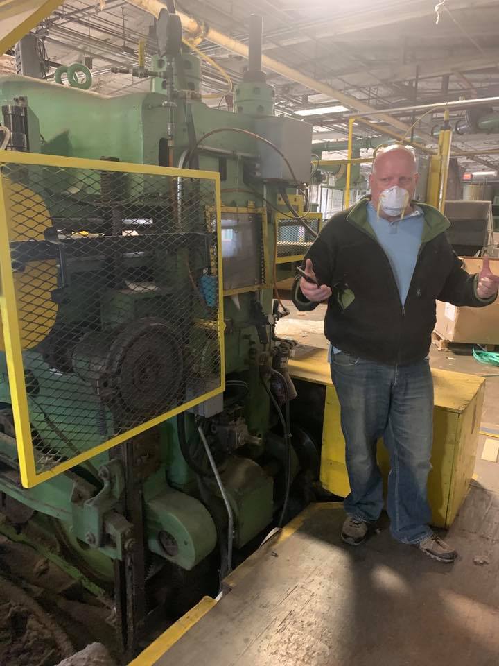 Shown is Norb Jenkowski, one of the partners of the recently-created Contollo Mass Manufacturing, LLC, which will be using this old cutter at the former Clark, Cutler, McDermott factory to manufacture surgical level isolation gowns for use in the fight against Covid-19. Photo used courtesy of Jeff Roy.