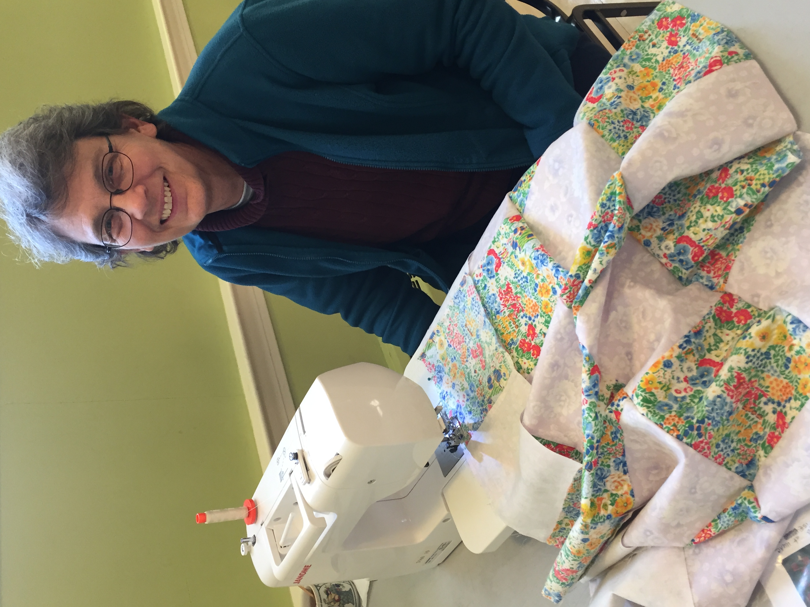 Dorothy Nail of Ashland  sews two “35-patch”  quilt tops as part of  a community service  project to benefit  cancer patients. 