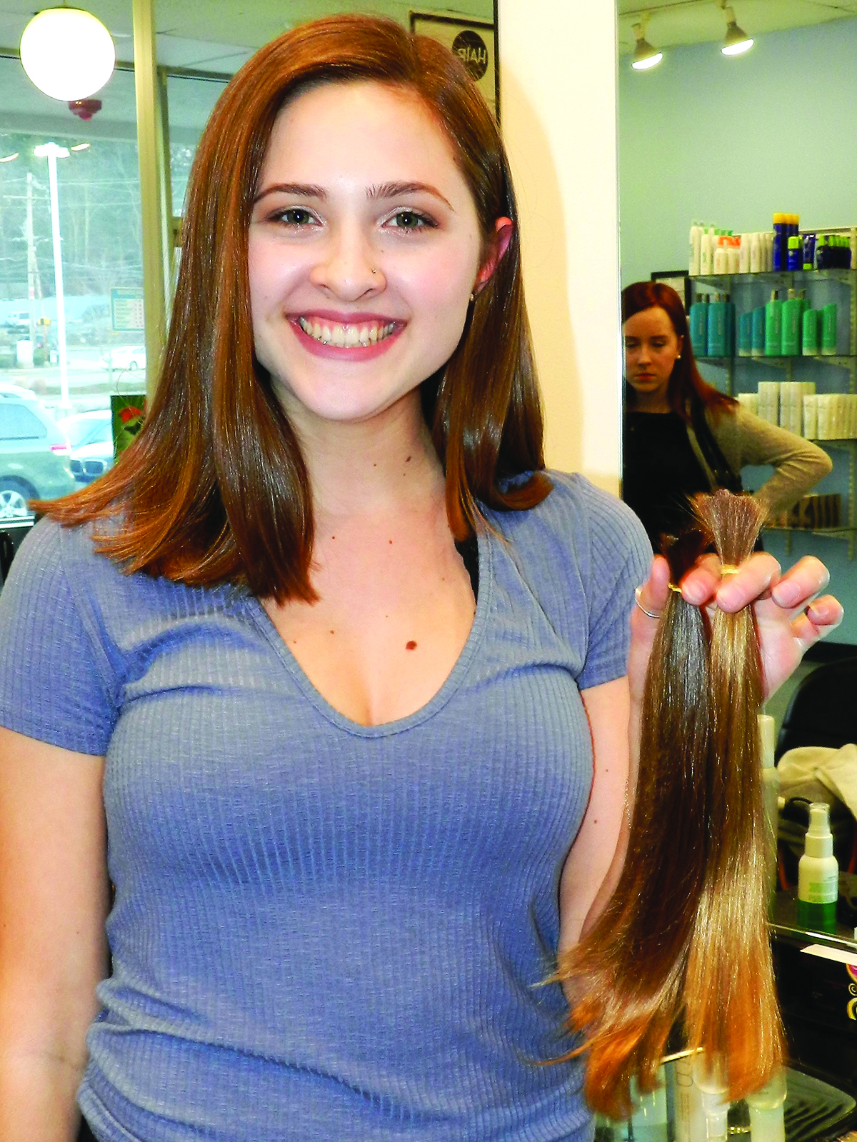 Ashland stylist Amanda Guillet at Hair 101 ensures the 10” minimum donation. (Photos/submitted)