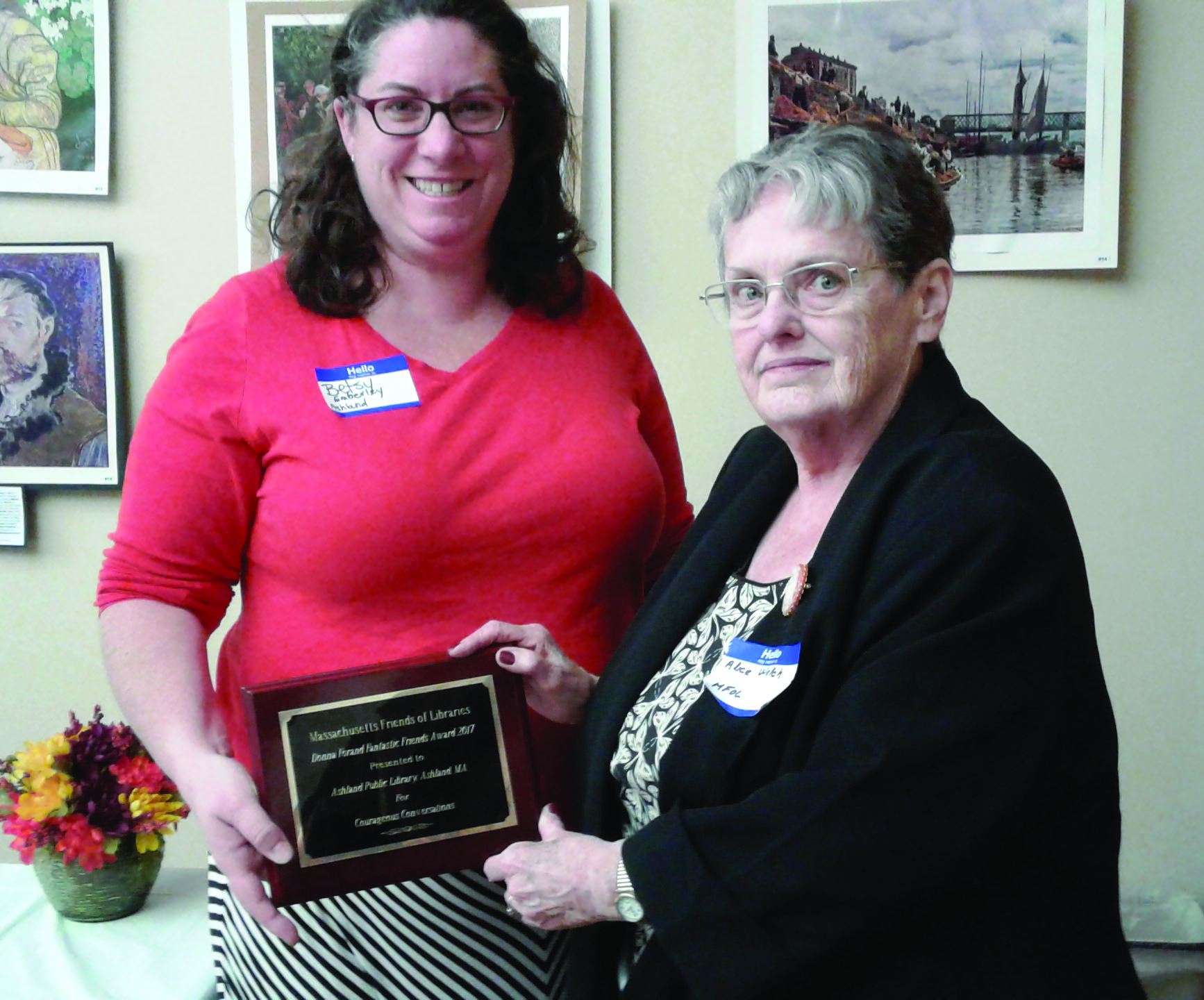 Friends of the Ashland Public Library President Betsy Emberley (left) accepts the 2017 Fantastic Friends Award from Mass. Friends of  Libraries President Alice Welch. (Photo/Cynthia Whitty)