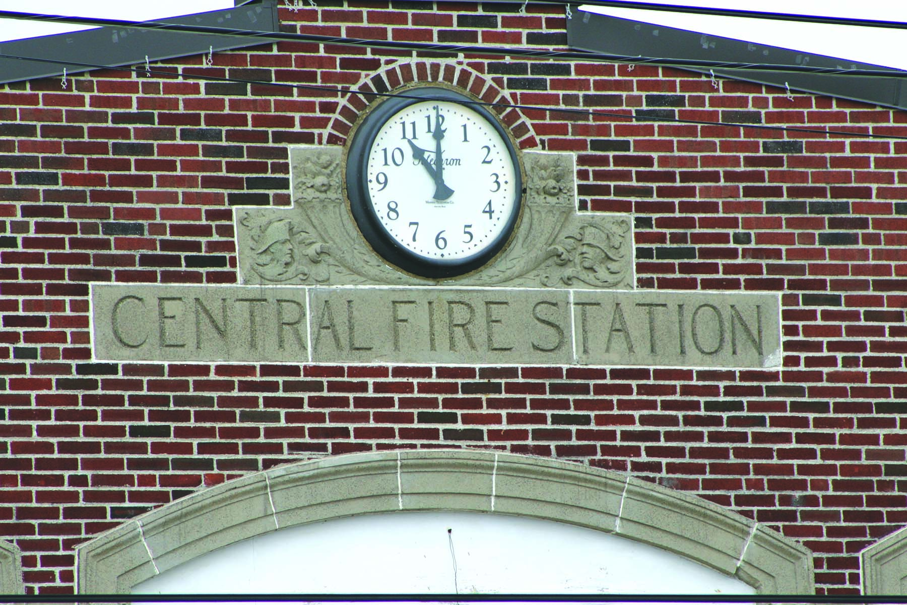 The Telechron clock on the downtown fire station can be seen day and night by hundreds of people driving through town.