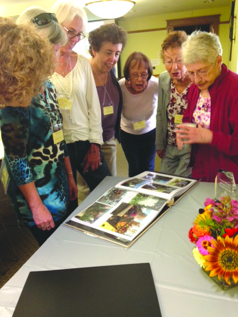 Garden club members and friends reminisce at the club’s anniversary celebration held this past fall. (Photo/supplied)