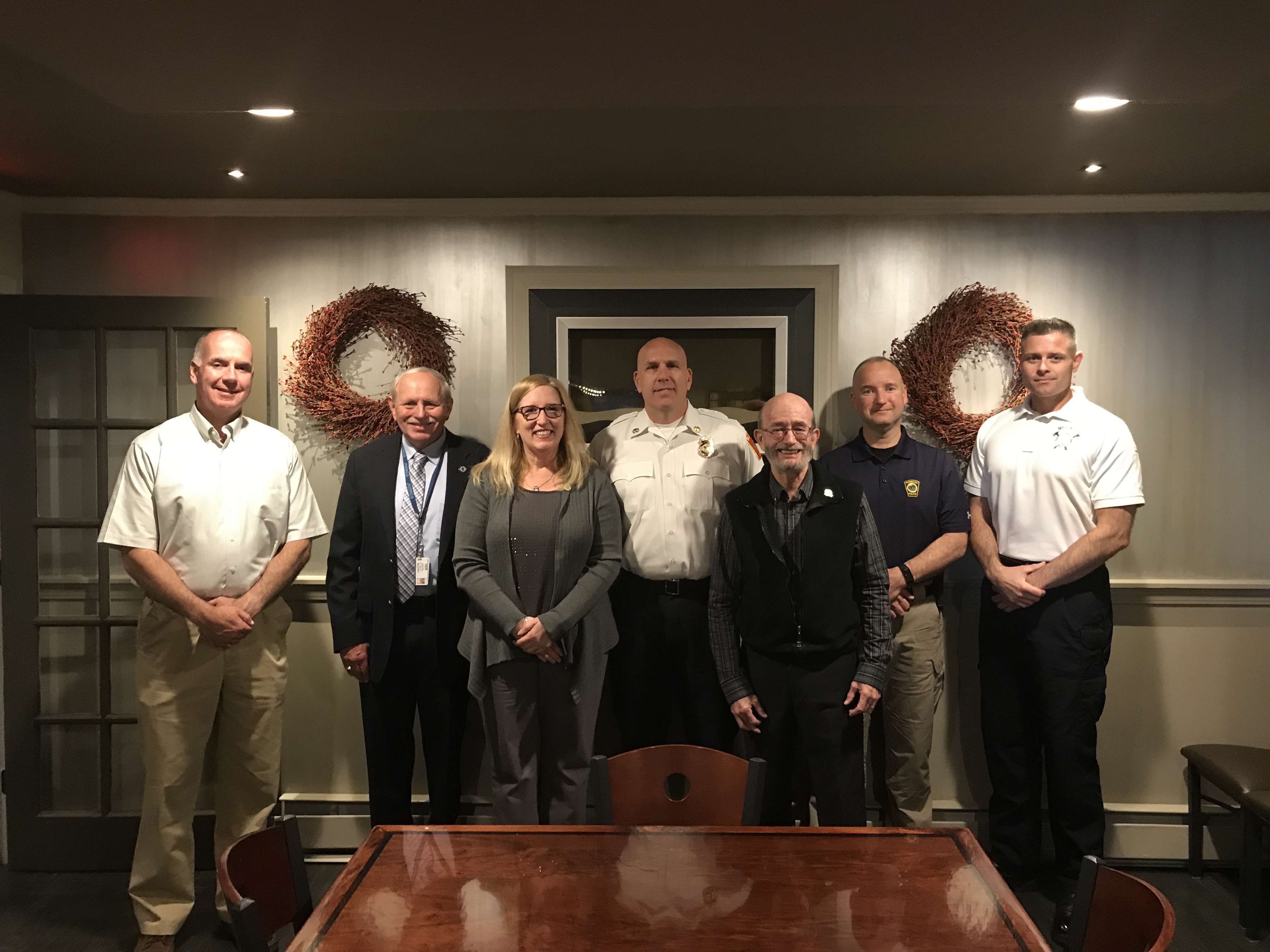 Local emergency and town officials recently attended a tabletop emergency planning meeting of the Central Norfolk Regional Emergency Planning Committee. From left, Kevin Shaughnessy, Asst. Sup. Norwood Light Dept., Doug Forbes, MEMA, Assistant Health Dept. Dir. Stacey Lane, Norwood Fire Chief George T. Morrice, Asst. Town Manager Bernie Cooper, Lt. Michael Benedetti, and Lt. John Cody.