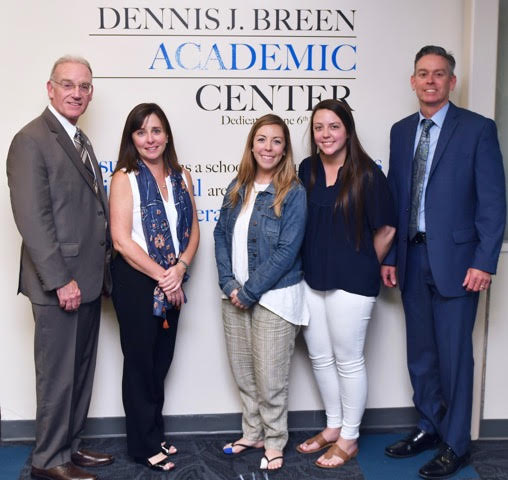 From left, State Representative Brian Murray, Kelly Breen,  Dennis’ wife, Samantha Breen, daughter, Shannon Breen,  daughter, Principal Derek Atherton