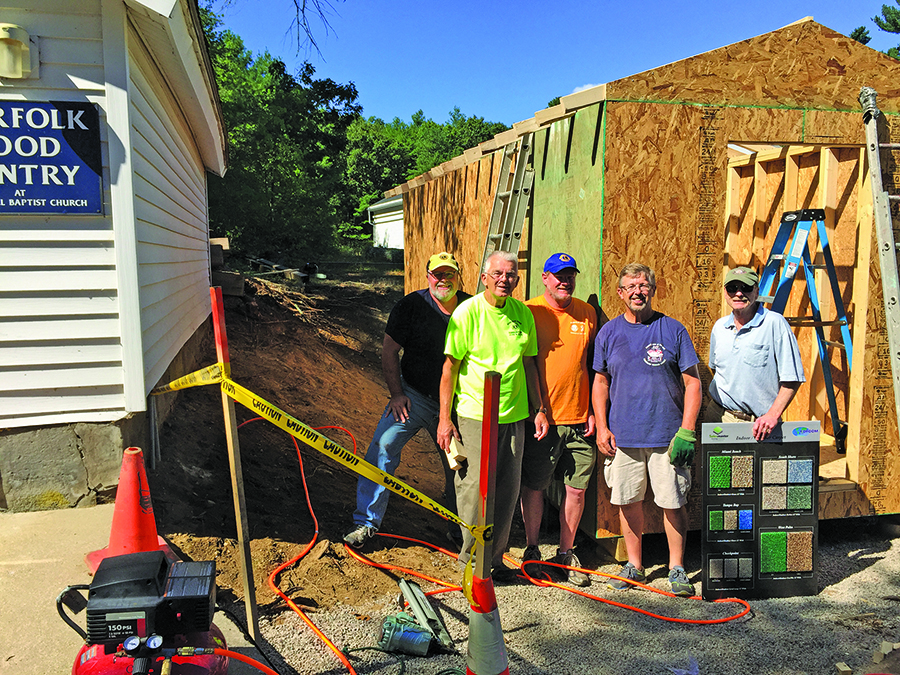 Norfolk Lions working on the food pantry shed. (l to r) Dave Brady, John Pokorny, Ed Melanson, Bill Hawkins, and Bruce Beans.