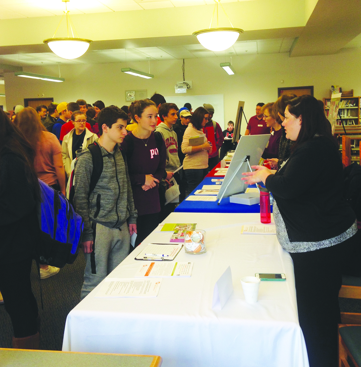 Representatives of a number of local nonprofits talk with Holliston High School students in HHS’ first ever Nonprofit Fair, an event organized by the HHS Student Council to help familiarize students with local volunteer opportunities nearby.