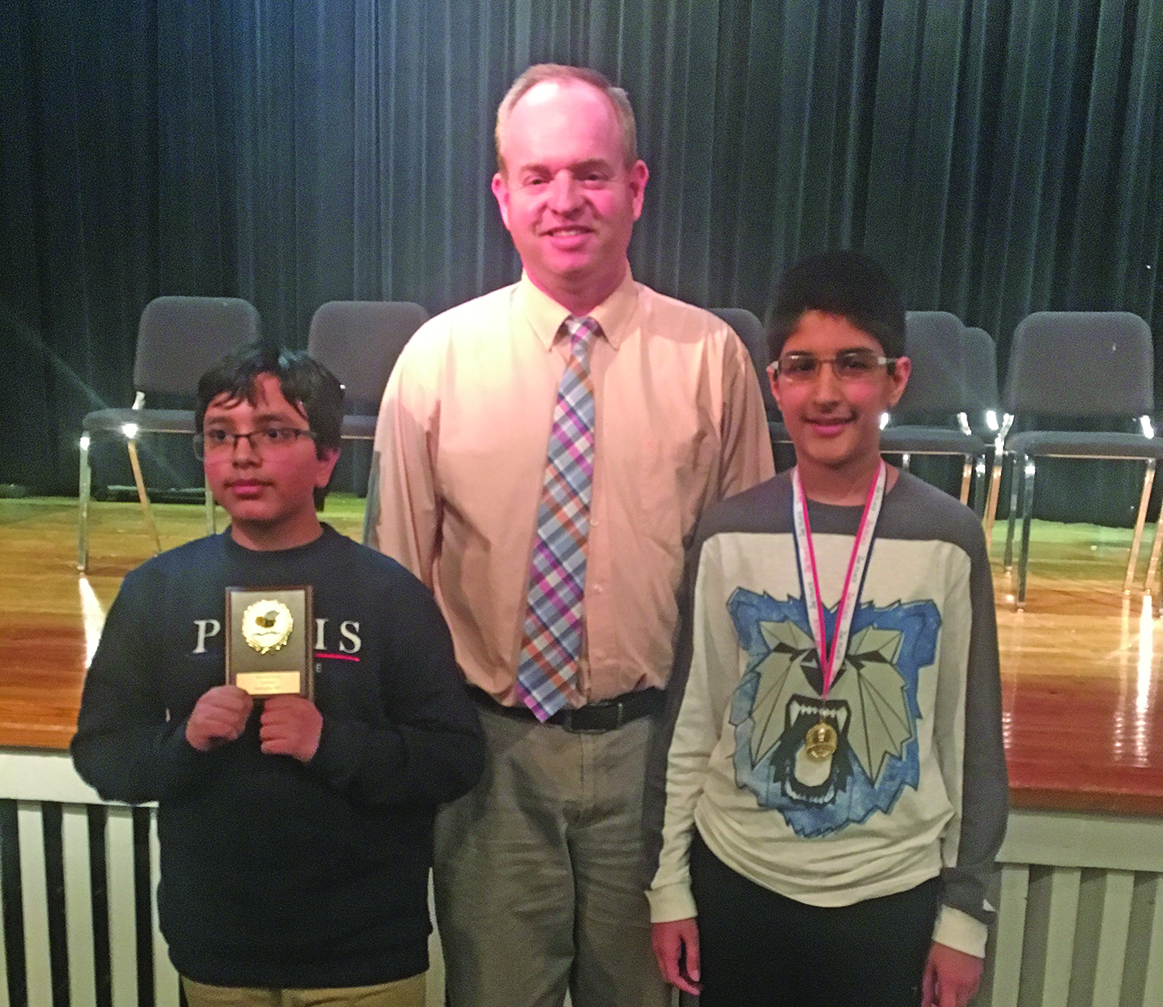 left to right: Vinny Kaushik, Principal Brian Miller, Ahaan Singh