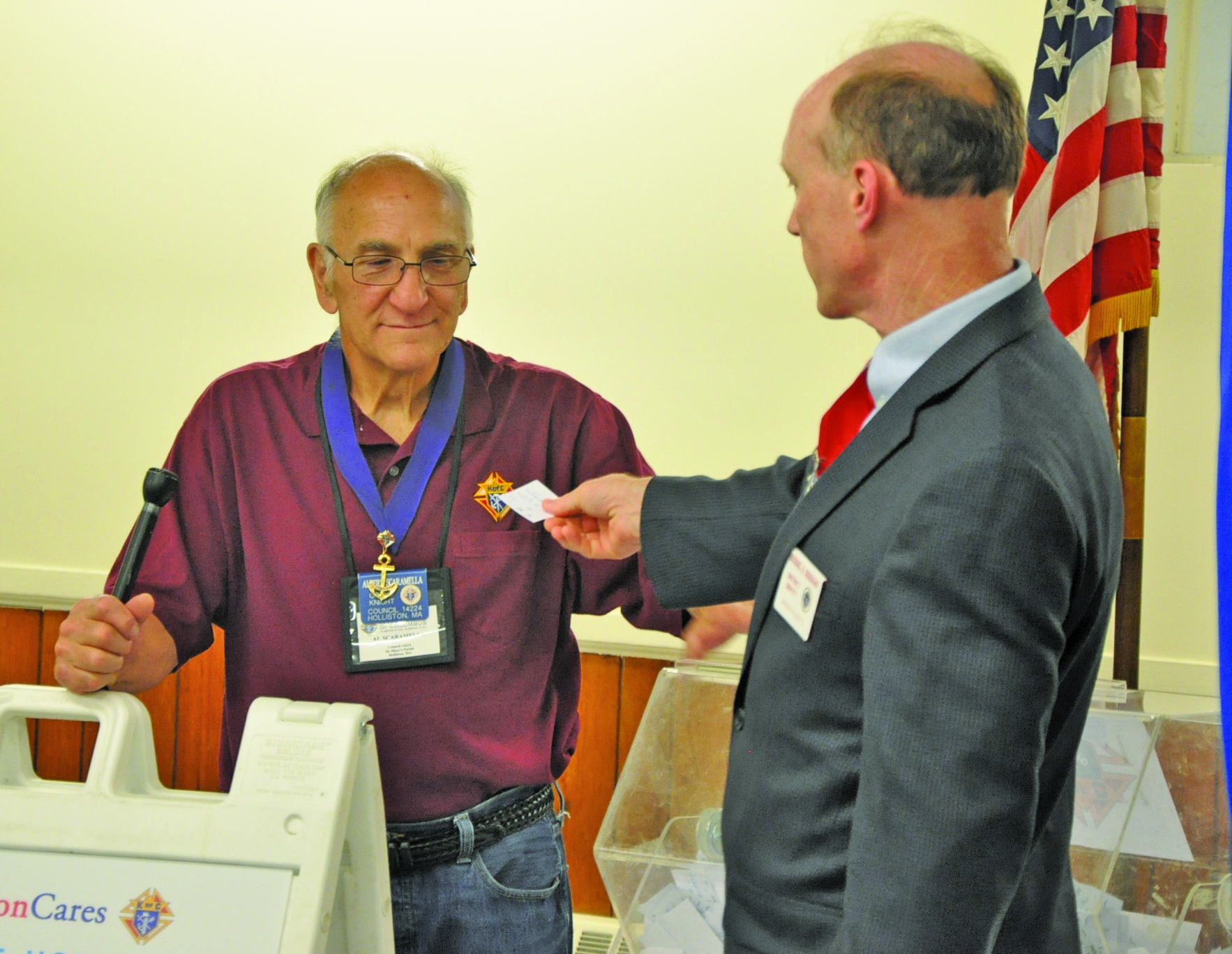 And the winner is… Knights of Columbus members randomly choose raffle winners. Photo taken by and used courtesy of Paul Saulnier, of The Holliston Reporter