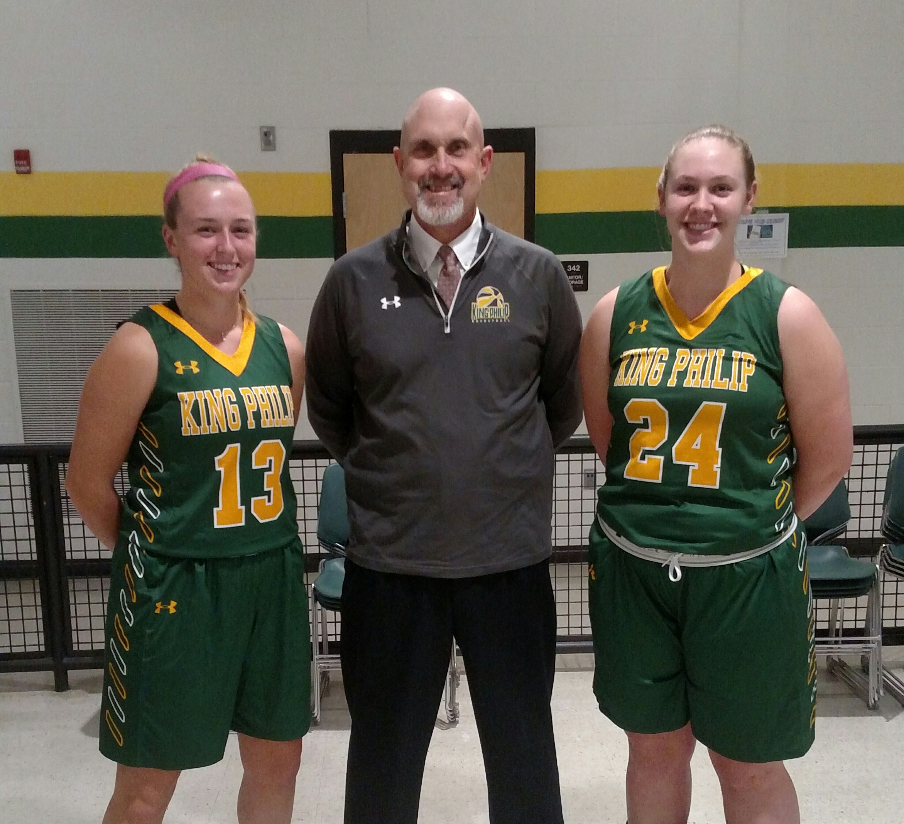 King Philip coach Marty Crowley with his captains--Christina Hathaway, left, and Courtney Kelleher.	 