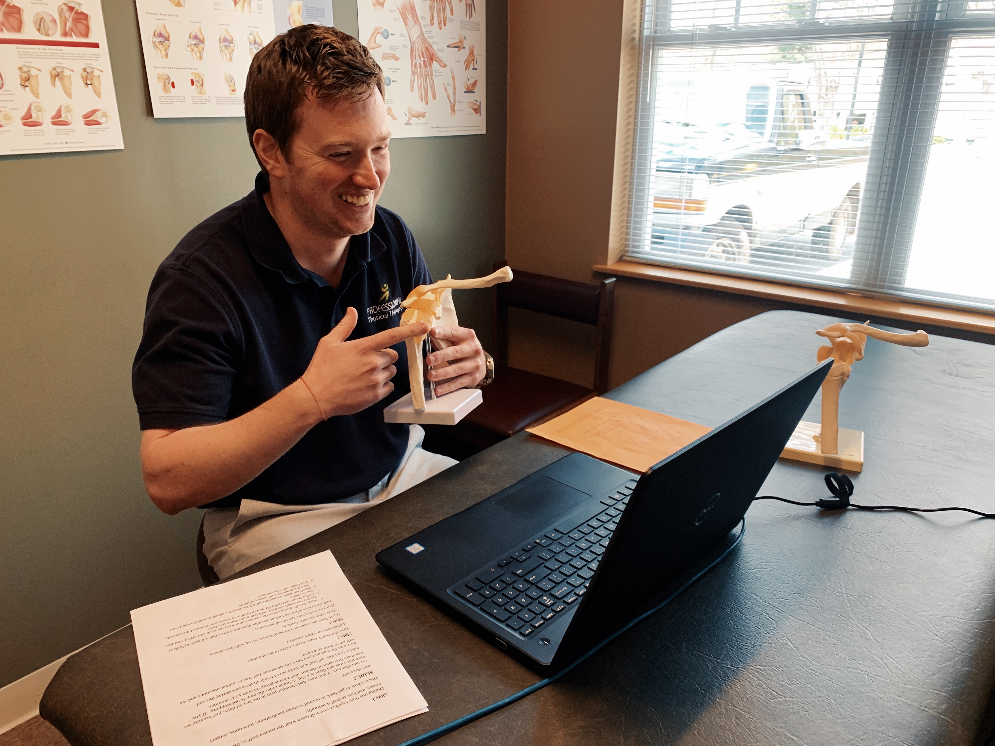 Shown, Dr. Patt, left, of Professional Physical Therapy and Sports Medicine demonstrates an online physical therapy workshop with patient Allie, right. The practice, which is still seeing patients, has taken its free community workshops online to socially distance. Two are scheduled this month.