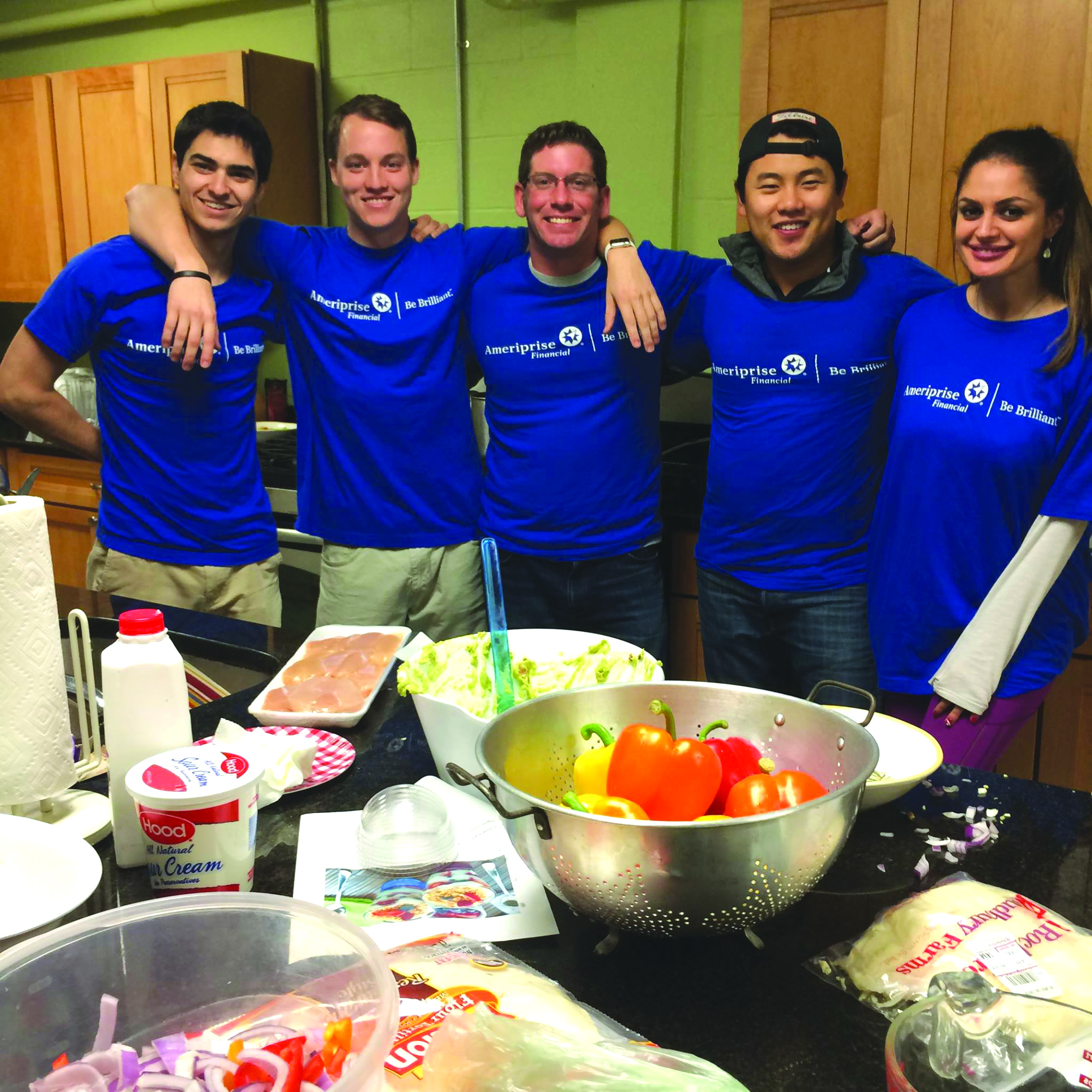 Volunteers cook dinner for a FPM family at the Federated Church in Ashland. (Photo/FPM staff)