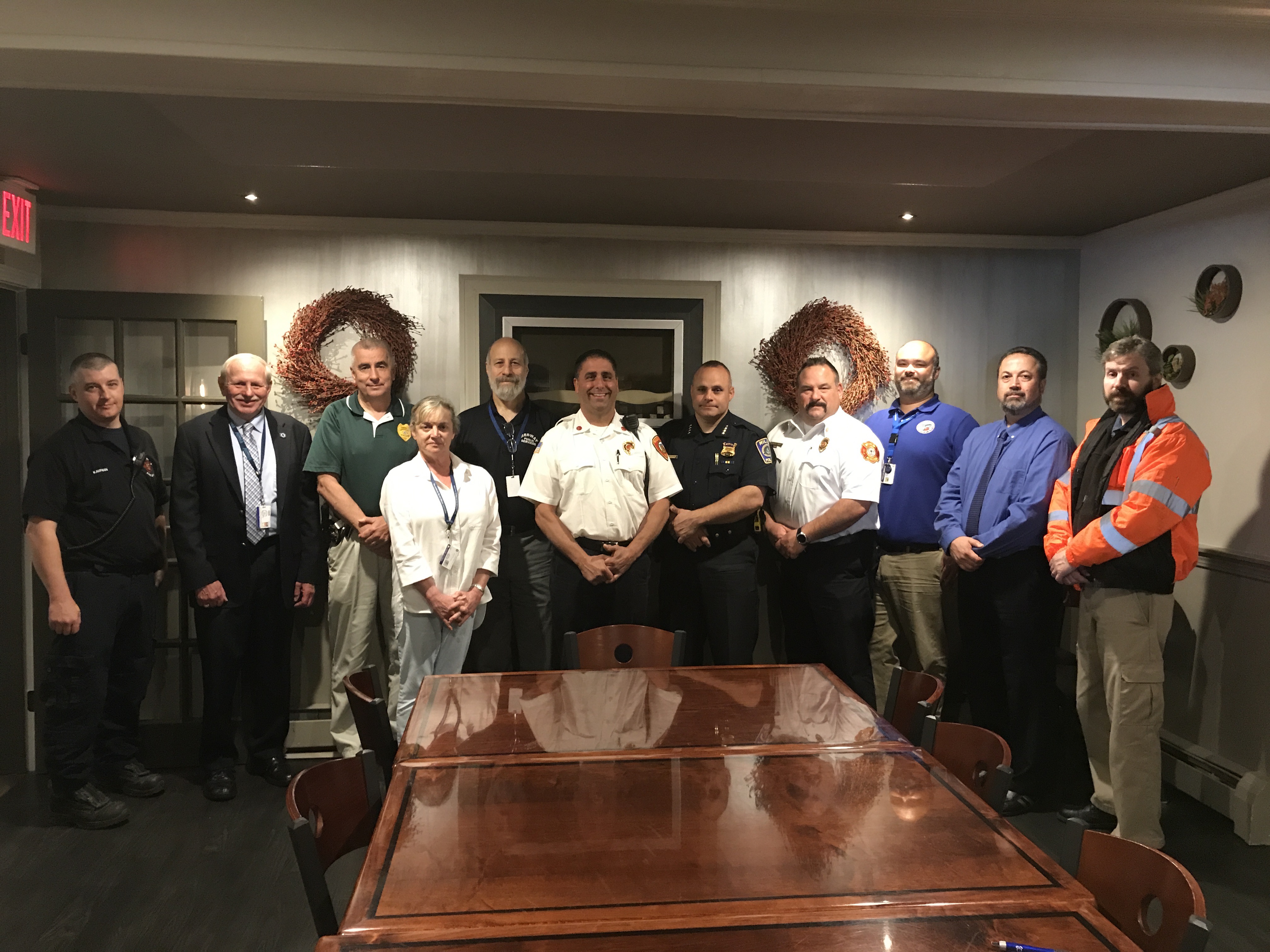 Local emergency and town officials recently attended a tabletop emergency planning meeting of the Central Norfolk Regional Emergency Planning Committee. From left, Jim Kaufman, EMS Coordinator, Medway Fire, Doug Forbes, MEMA, Medway Police Chief Allen Tingley, Beth Hallal, Health Director, Medway, Dave D’Amico, DPW Dir. Medway, Mike Fasolino, Dep. Fire Chief, Medway, Millis Police Chief Chris Soffayer, Millis Fire Chief Rick Barrett, Peter Pelletier, Dep. DPW Dir., Medway, Millis Town Administrator Michael 