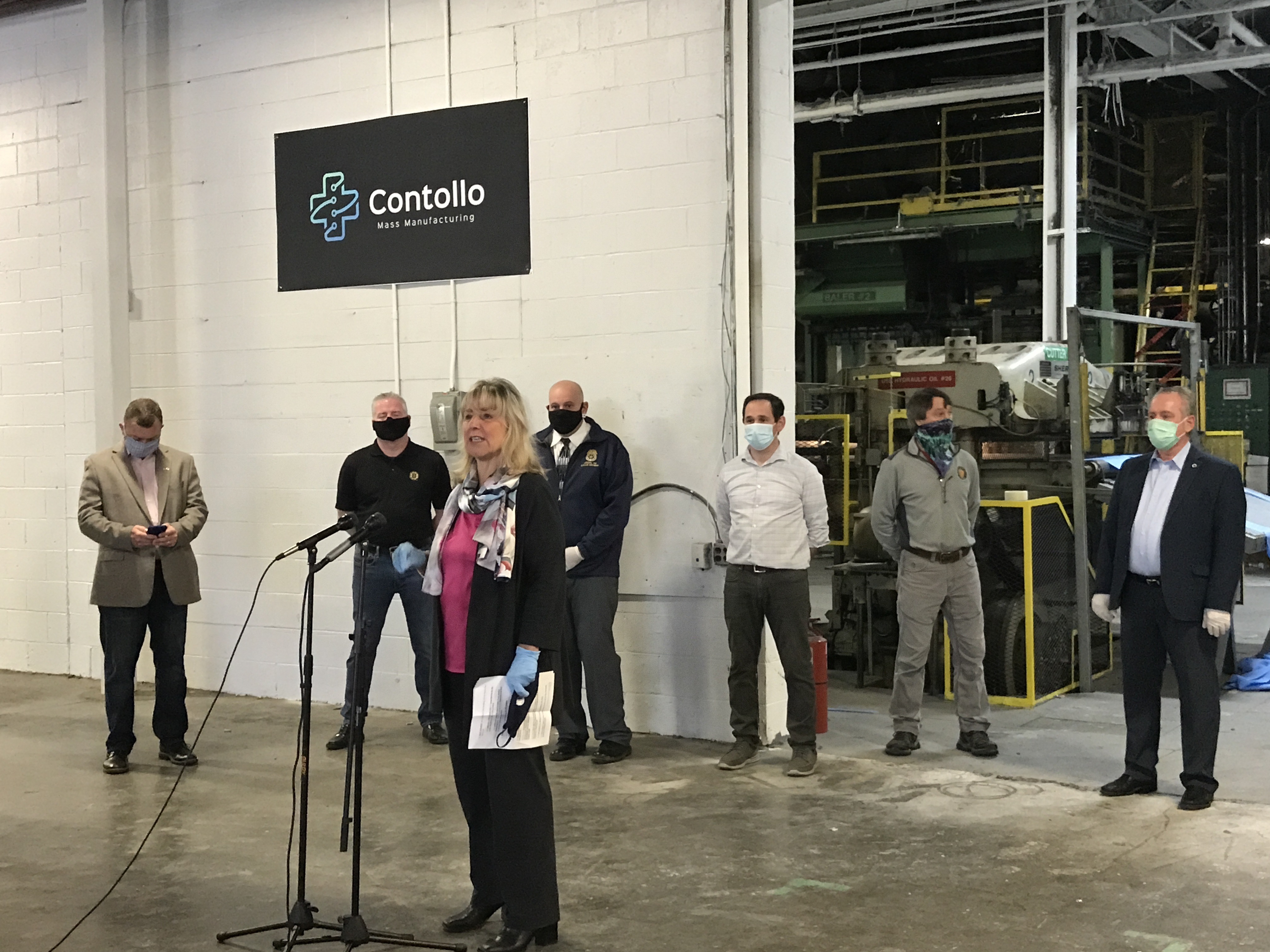 After opening remarks, Sen. Karen Spilka speaks to the group gatheredat te new Contollo Mass manufacturing to celebrate the onstart of manufacture of PPE, in the form of surgical gowns federally approved at the highest level, in Franklin.