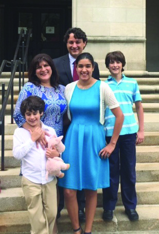 Lelia Tenreyro-Viana, a native-born Argentinean, is proud to be a naturalized U.S. citizen. and celebrates here with husband Tony and children Cecilia, Francisco and Joaquim. (Photo/courtesy of the Viana family)